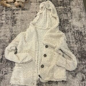 off-white colored women's cardigan never worn good condition
